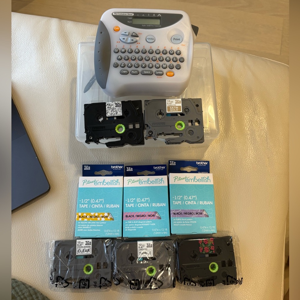 P-touch labeler - Container Store model with case and tape cassettes